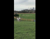 Three girls weird ritual arm movements park