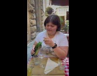 Girl drinks glass of olive oil says its wine 