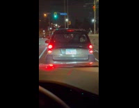 Man sitting at the back of car 