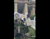 Four women in velour tracksuit dances on the stairs