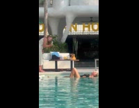 Woman bikini lie down for pool photo