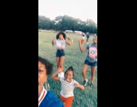 Girl in blue jersey shouts different drugs, girls behind her chant