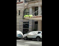 Collab winy - Two men remove bricks on roof sides