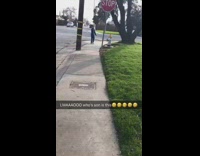 Little boy walks by in blue track suit says damn