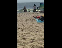 Woman black bikini photo shoot beach stripes Part 1