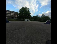 Girl rollerblades down ramp falls on butt 