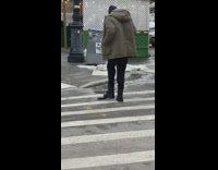 Guy kicks dead rat towards sidewalk 