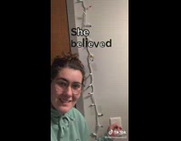 Girl turns lights off to change text