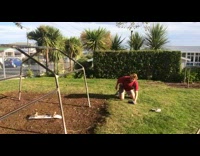 Red shirt guy skateboard metal jungle gym 