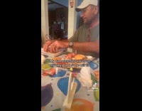 Man pretending to prepare puppys food 