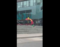 Inflatable tube man stuck on its side towards one direction 
