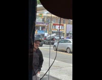 Man on truck bed holds the load