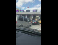 Collab WINY - Clamped Gray Car Lines Up on Toll Gate