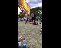 Couple poses with Eiffel tower 