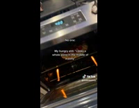 Man Cooks Pizza in Party and Checks it