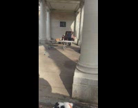 Guy using park table to shoulder press