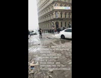 Thigh high black boots in snowstorm 