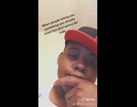 Black red jordan hat guy nods head