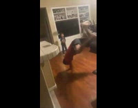 Two boys do cartwheels 