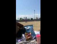 Purple pants girl beach sand friend walks 