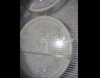 Phone camera shows inside of stove 