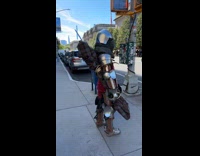 Collab WINY - Man wears medieval armor outside of MET 