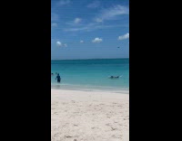 Woman lie down crystal kayak with drone