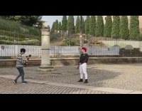 Guy red hair black sweater dance park