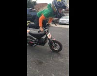 Little boy rides motorcycle up ramp fail 