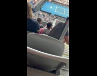 Man places camera behind and watches match