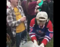 NSFW Slow motion wolves oilers jersey guys smash beer on forehead 