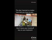 Criminal escapes handcuffs keys keyboard