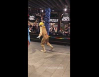 2 clowns spin on a rope together 