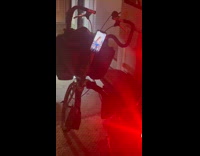 Bike with flickering red light and dancing girl