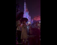 Man tiktok dance behind crowd at Disneyland