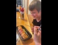 Kid dislikes the taste of wasabi paste