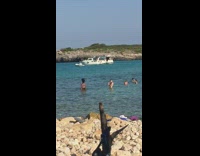 Woman white bikini hair flip water photo shoot