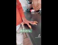 Girl wears bugles chips like fake nails 