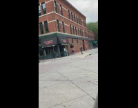 Girl chun li costume street brick wall