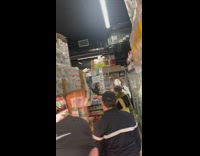 Guy white hazmat suit market bodega basket 