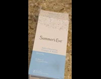 Summers eve empty box white blue floor 