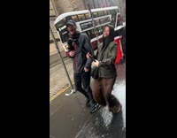 Woman films using storm amy audio because of strong wind 