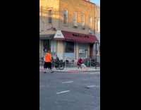 Man catch sky lantern pushed to the side