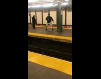 Guy practices martial arts while waiting