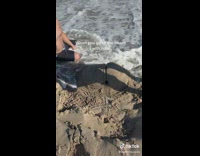 Water Made It Through Bum-Shaped Sand Castle