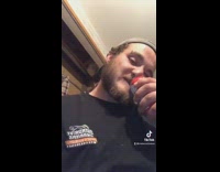 Guy uses teeth to open beer can