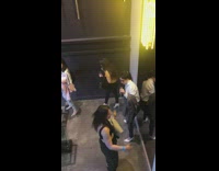 Drunk girls dance on stairs mirror party