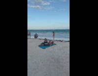 Woman black bikini hold coconut beach part 2