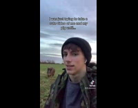 Brown pig jumps and knocks guy over 