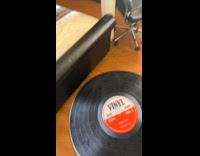 Guy has massive vinyl rug in room 